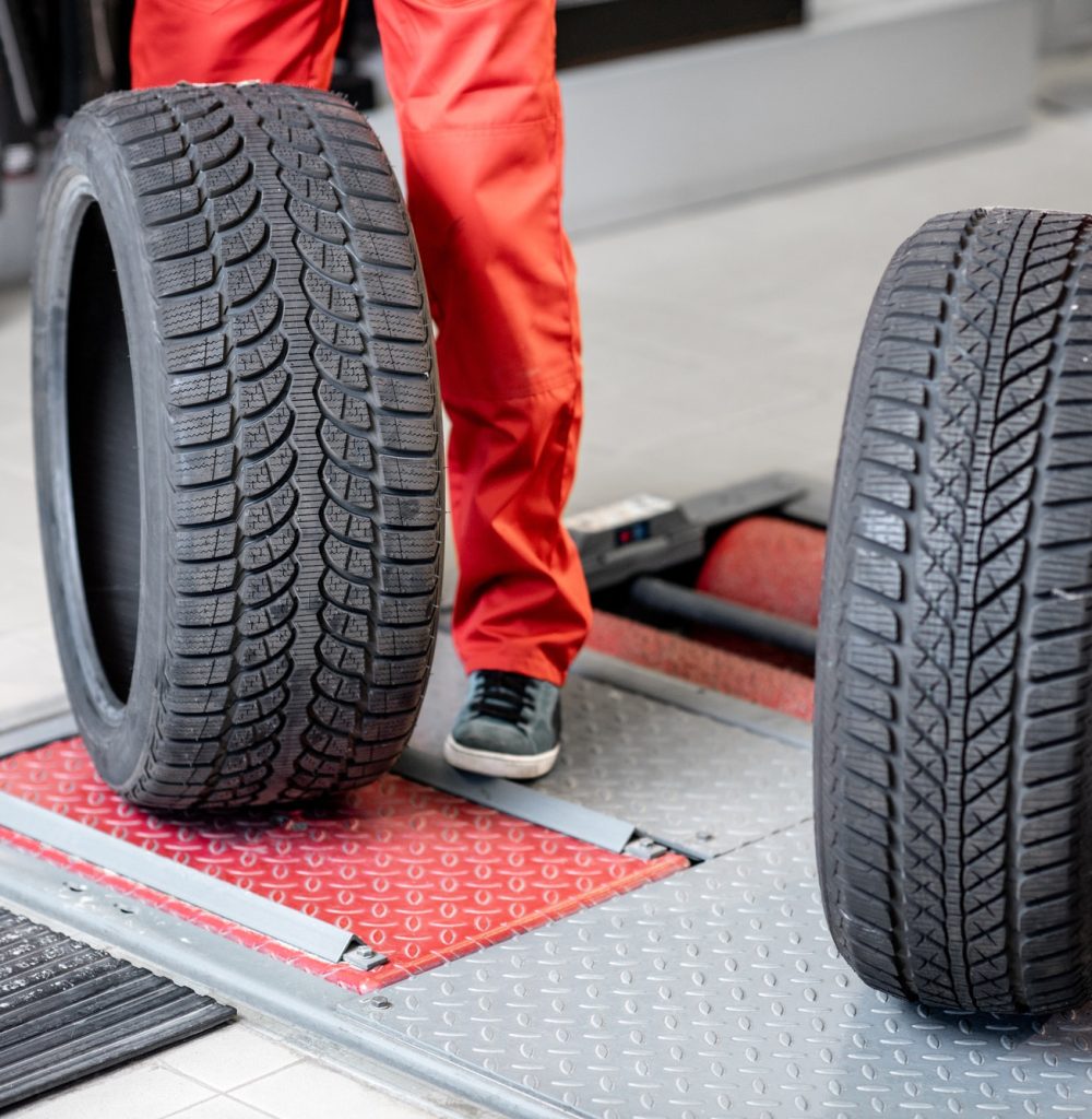 carrying-new-tires-at-the-service.jpg